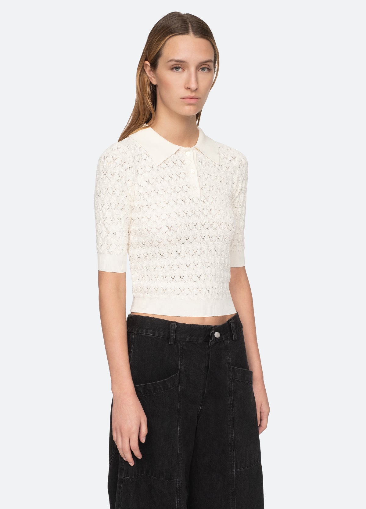 cream-rue polo sweater-three quarter view - 9