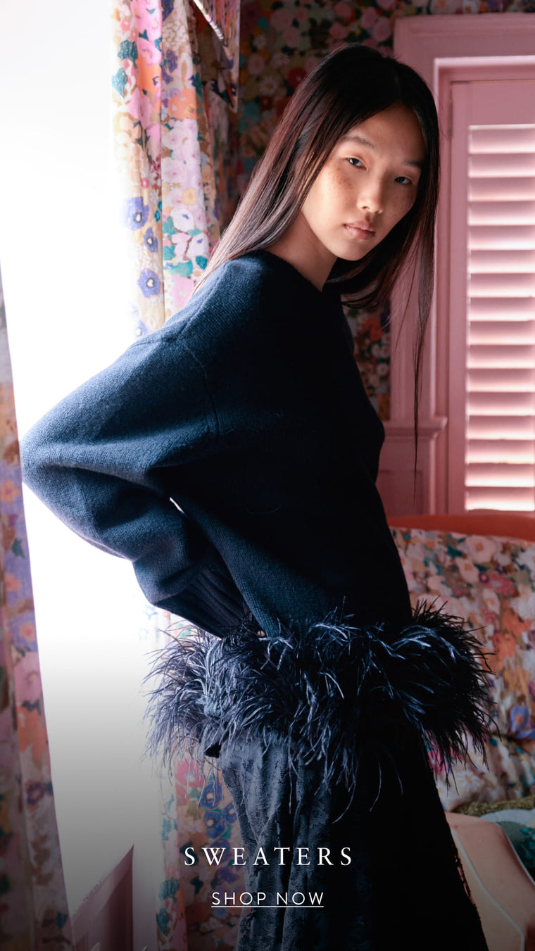 SWEATERS