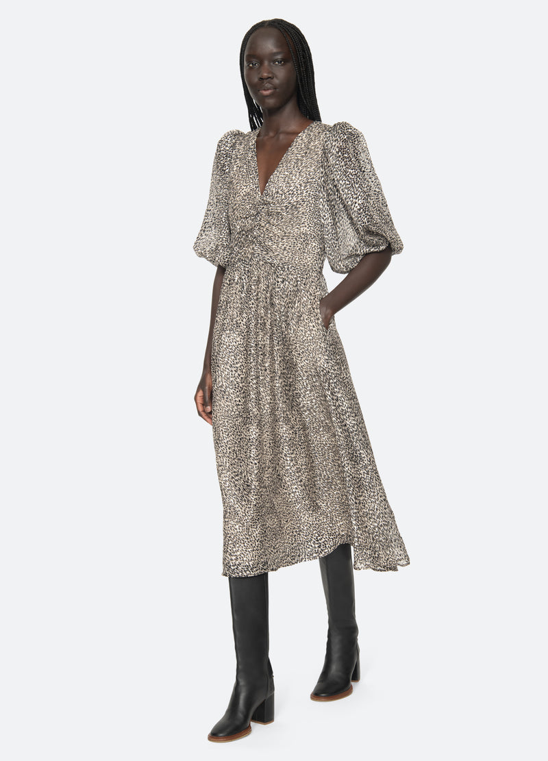 cream-charlize s/s dress-walking view - 1