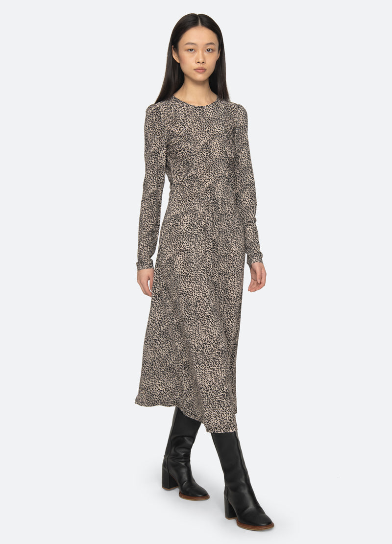 cream-charlize l/s dress-walking view - 1