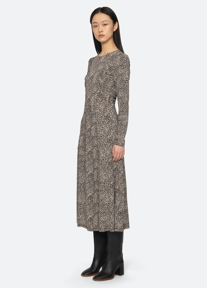 cream-charlize l/s dress-three quarter view - 4