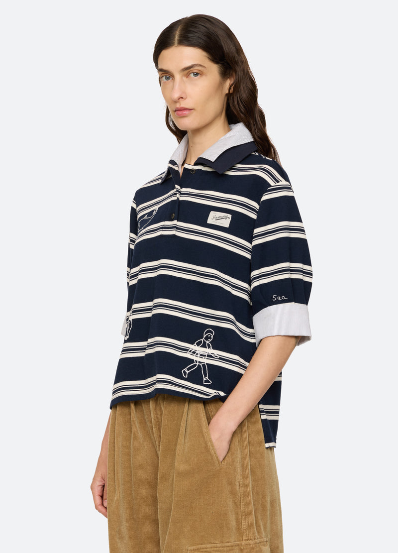 navy-mina polo-three quarter view - 5