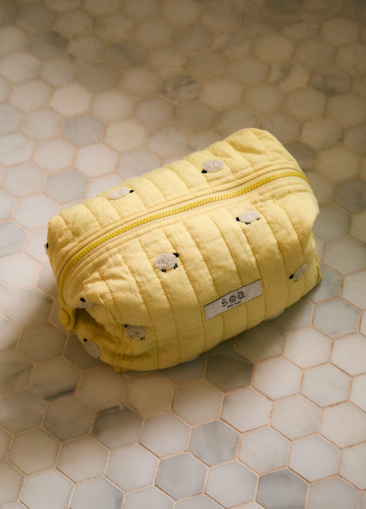 yellow- sheep cosmetic bag-editorial view - 2