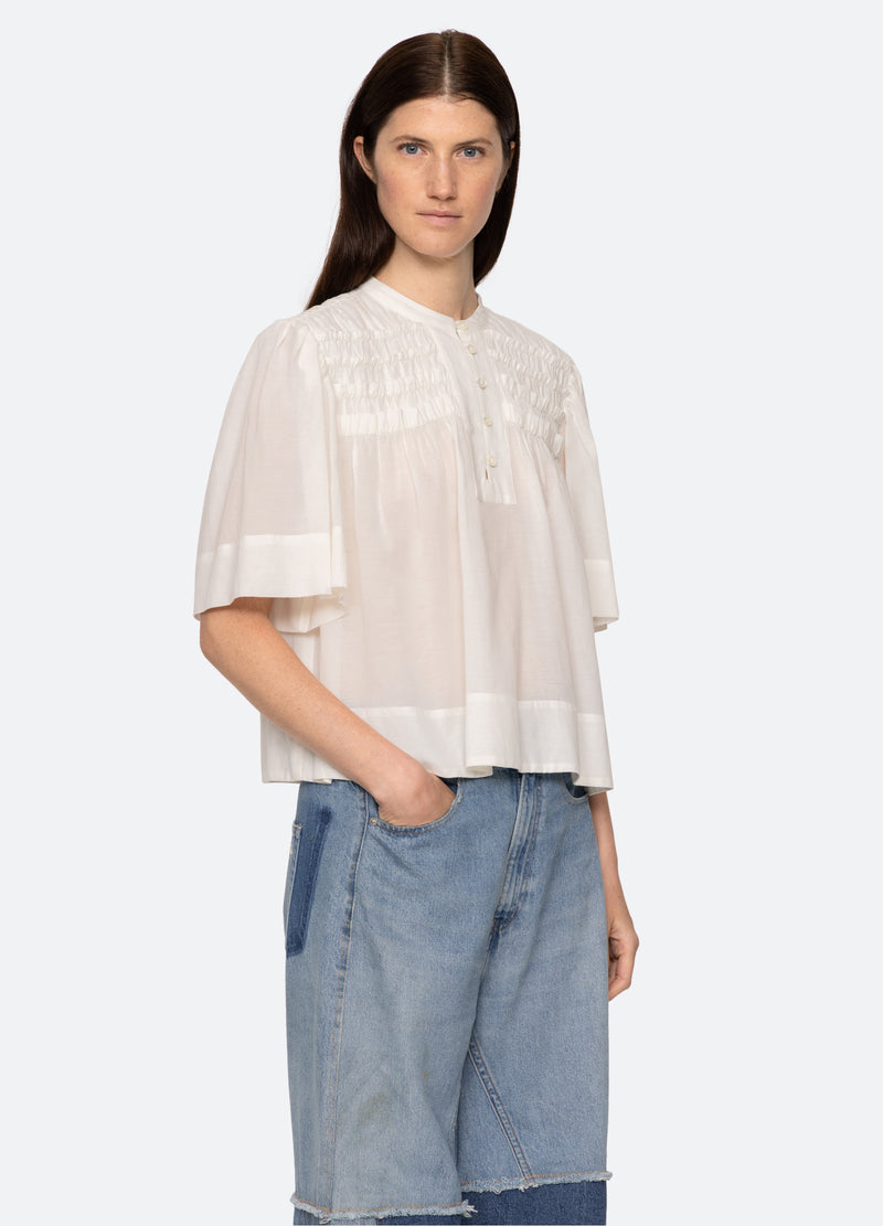 cream-nomi s/s top-three quarter view - 4