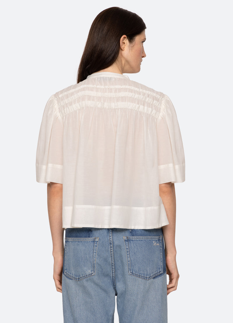 cream-nomi s/s top-back view - 2