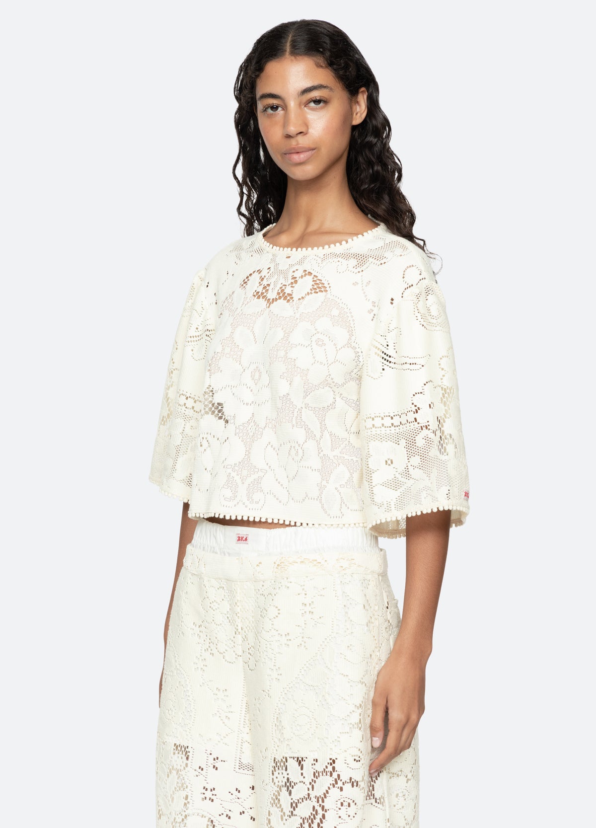 cream-arianna top-three quarter view - 13