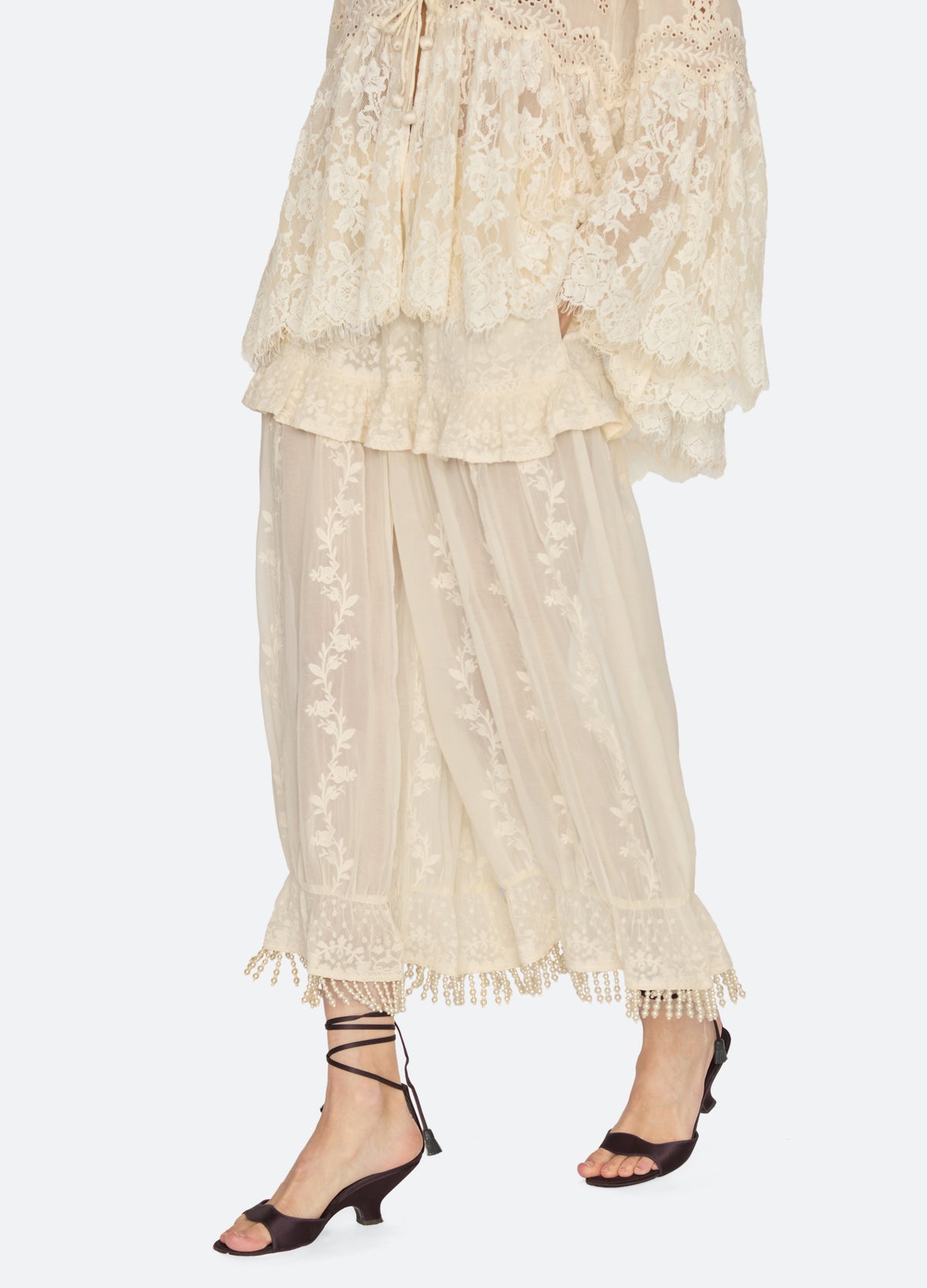 cream-gertrude pants-walking view - 7