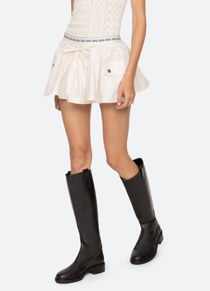 cream-lois shorts-walking view - 6