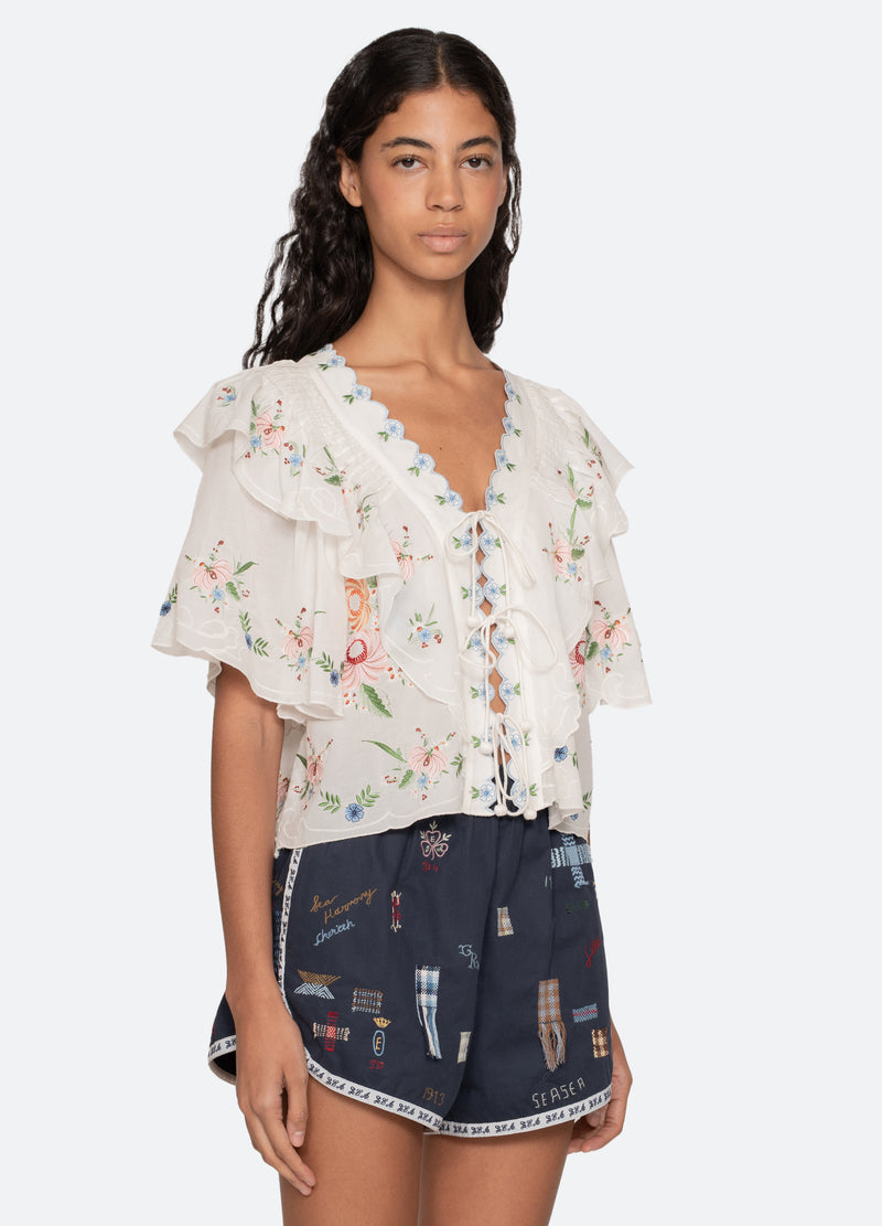 cream-serafina s/s top-three quarter view - 5