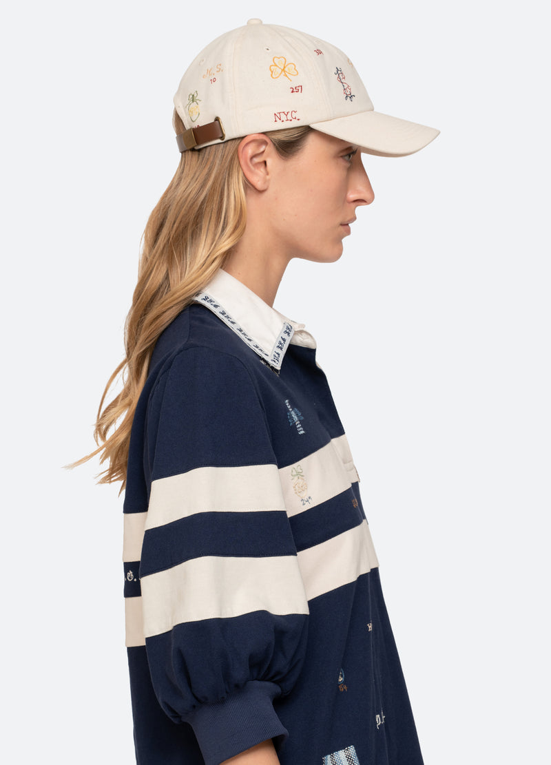 cream-claira hat-on model side view - 7